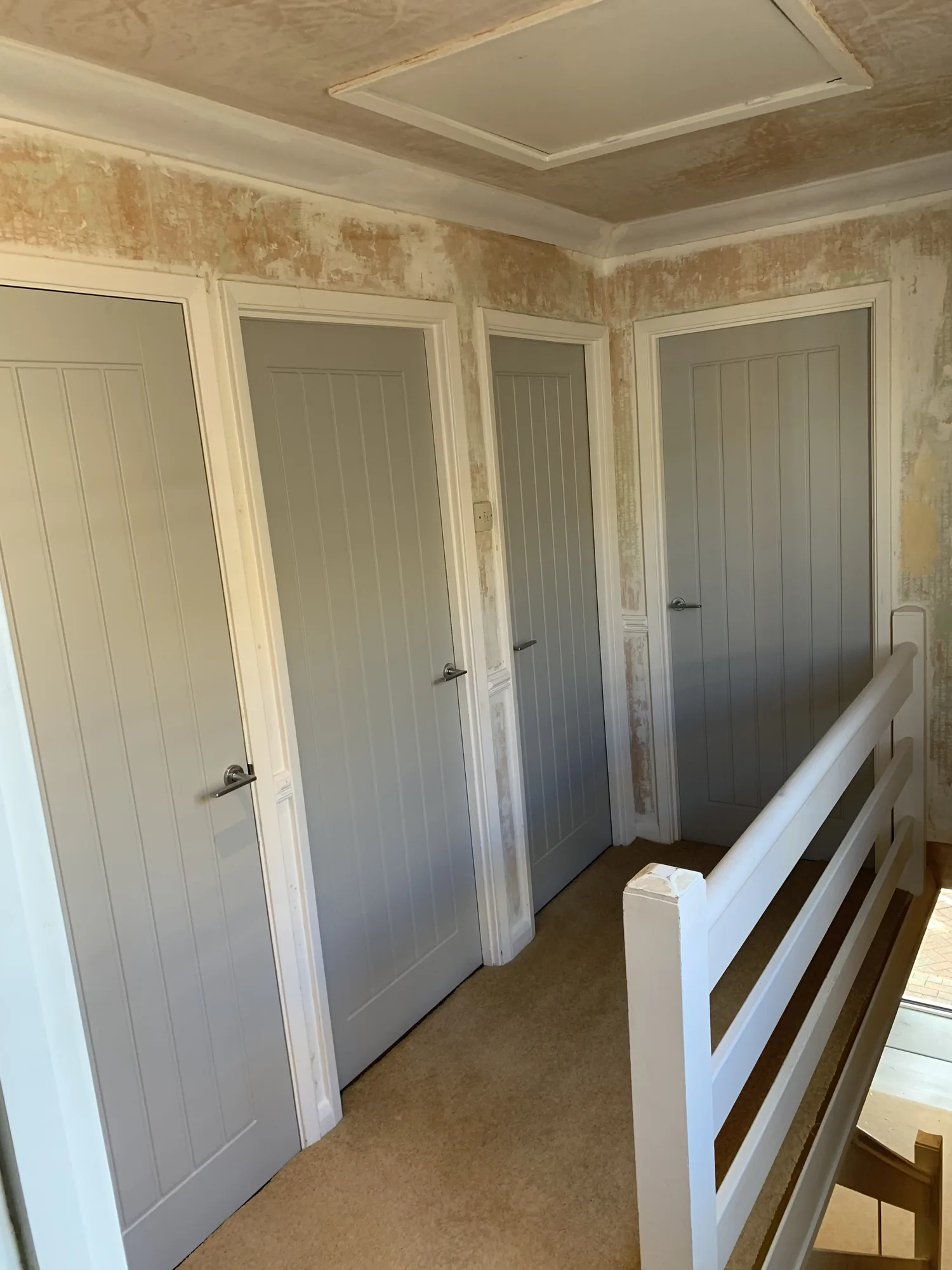 Bespoke oversize oak door hung in a period property